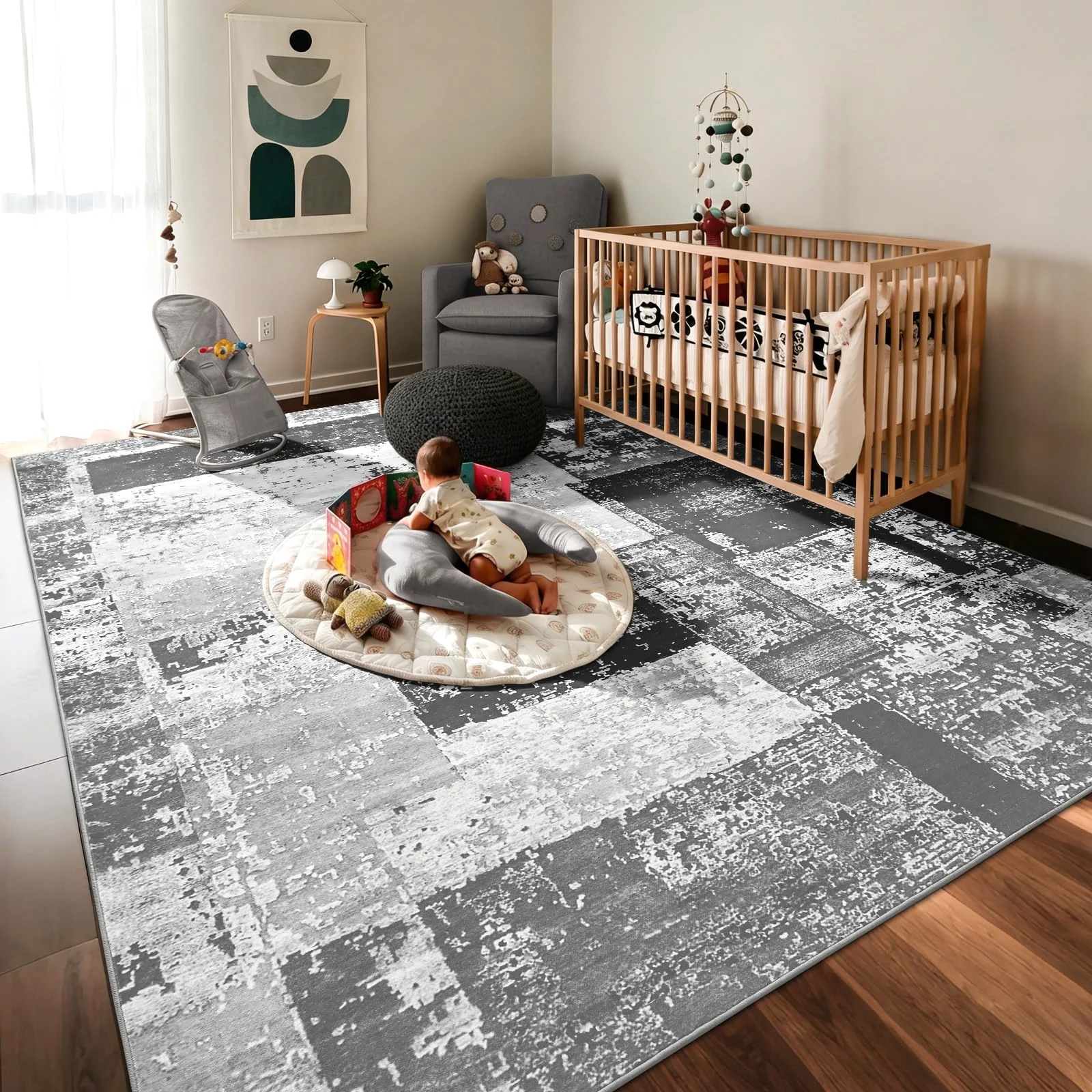 A nursery where the rug reaches past the crib on three sides, which is the point of the size.