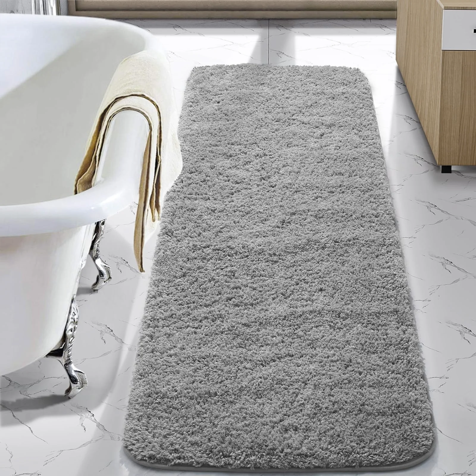 A gray LOCHAS chenille bath runner beside a freestanding tub